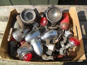 Box of old cycle lamps