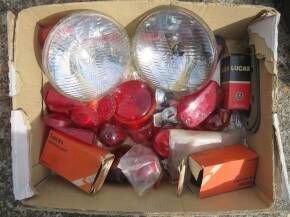 Qty of mainly Lucas light lenses, some boxed NOS, two sealed beam units