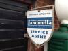 Officially Appointed Lambretta Service Agent, an extremely rare wall mounted revolving enamel sign of shield form in the original cast bracket