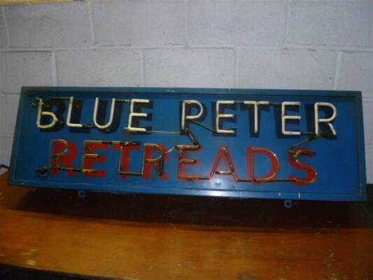 Blue Peter Retreads, a period neon sign, some damage to the neon but good colours