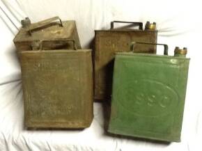 Four 2gallon fuel cans (Esso, Shell, Pratts) t/w 7 brass caps, A.A Co Ltd, Esso, BP and Pratts