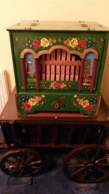 Alan Pell Balchin 20 note organ with canal art decoration to include 15 rolls music (average 5 tunes per roll) on a wooden European style 4wheel cart. Stated to be in good working order