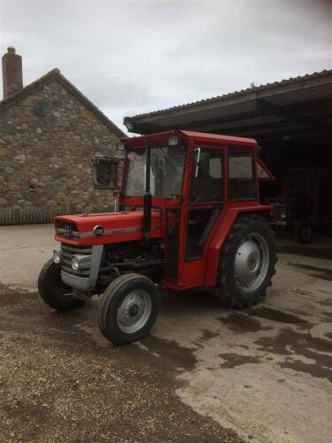 c1960s MASSEY FERGUSON 135 3cylinder diesel TRACTOR Fitted with a new cab, foot throttle, PAS, new seat and drawbar. The paintwork is described as being very tidy and the lights are reported to be working. The vendor states that there is a slight diesel l