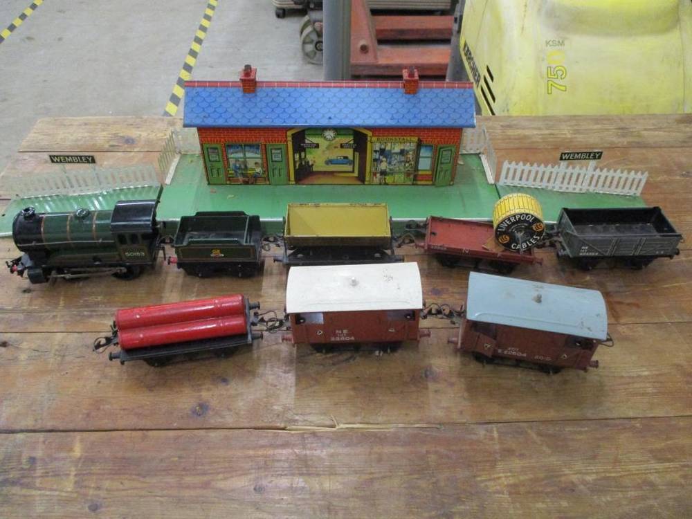 Hornby O gauge Wembley station locomotive and tender in green brake van 2 McAlpine tip wagon gas cylinder wagon flat truck and cable drum and coal wagon Cambridge Vintage Sale Sale