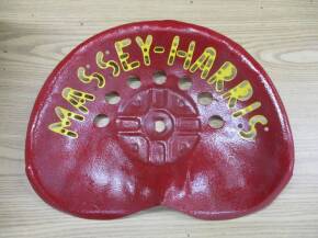 Massey-Harris, a tin tractor/implement seat