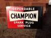 Dependable Champion Spark Plug Service, a double sized, flanged enamel sign