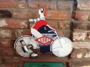 Miller, a shop counter sign in the form of a cyclist, fitted with rear BMP and dynamo