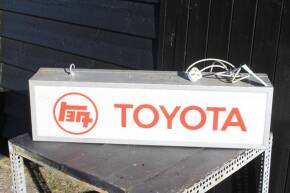 Toyota, a double sided illuminated hanging showroom sign, 36x10x7ins