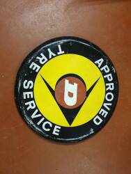Dunlop Approved Tyre Service, a raised circular printed aluminium sign, 30ins dia'