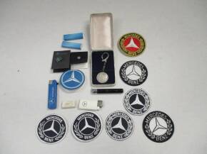 Mercedes-Benz promotional material including lighters, lapel badges, sew on badges etc