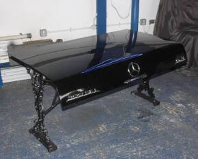 Mercedes-Benz table constructed from 6.3 300SEL and fine cast iron ends c/w rare and correct badges 54 x 34 x 28ins tall