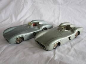 Mercedes-Benz tinplate friction drive W196 style cars (2), 11ins long one lacking the perspex screen, marked Made In Western Germany