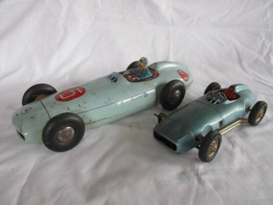 Mercedes-Benz tinplate friction drive monoposto racer, 15ins long marked Made In France t/w another Made In 'Western Germany' tinplate W196 style racer lacking a front wheel, 10ins long