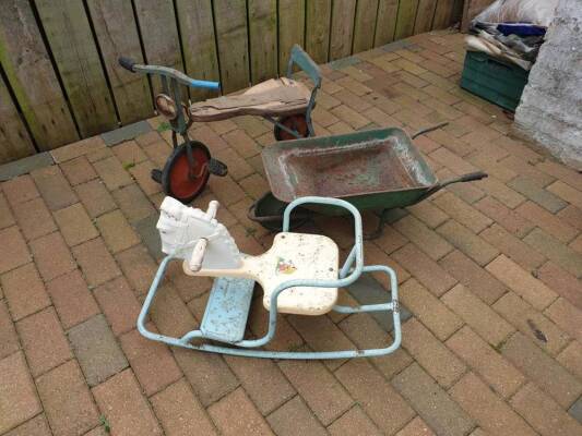 Triang child's tricycle, tin rocking horse and child's wheelbarrow (3)