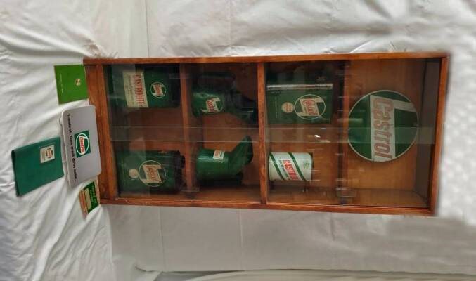 Display cabinet of Castrol memorabilia