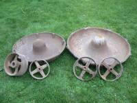 Cast iron pig troughs and pulley wheels
