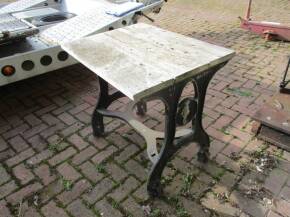 Cast iron framed bench, the end plate marked His Majesty The Somersault
