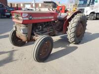 1960s MASSEY FERGUSON 135 4cylinder petrol TRACTOR Serial No. D11 257 Appearing to be in original condition with straight tinwork.