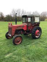 INTERNATIONAL B-250 4cylinder diesel TRACTOR Reg. No. LJL 785 Serial No. 17993 Fitted with a Lambourn cab, lights, rear linkage and drawbar. The vendor reports this is a good original tractor with a new battery and good oil pressure. V5 available