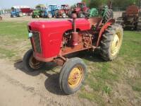 DAVID BROWN 990 diesel TRACTOR Finished in red and described as part restored.