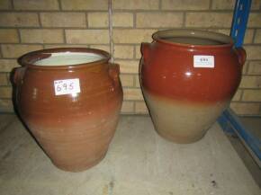 Two glazed earthenware storage jars (pippins)