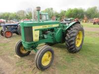 JOHN DEERE 720 diesel TRACTOR Fitted with a petrol donkey engine and stated to be an earlier restoration.