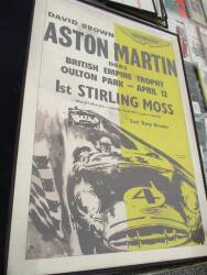 Aston Martin, 3 framed and glazed reproduction posters, ex Goodwood Revival props 40x28ins each