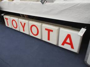 Toyota, a large original showroom hanging illuminated sign consisting of 6 individual cells, c1960s, 86x14x5ins