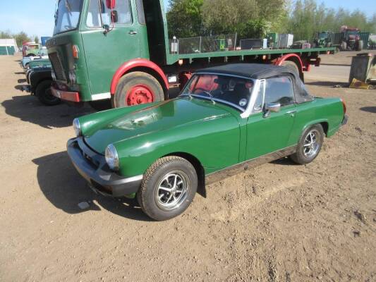 1977 MG Midget 1500 Reg. No. SPW 669R Chassis No. GAN6 185925G Finished in British Racing Green with a black interior this Midget has been recommissioned after 5 years off road. The vendor informs us that recent parts replaced include the battery, master