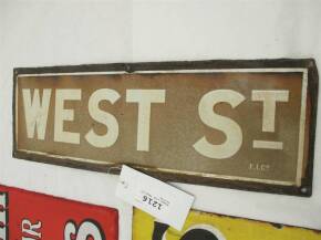 Enamel sign 'West St' 21x7ins