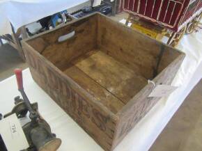 A Daddies Sauce wooden crate to hold 6 dozen jars