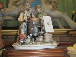 Capodimonte 'Competture De Rica' chesnut seller 14.5x11.5x10ins