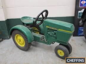 John Deere, childs pedal tractor of heavy duty metal construction in row-crop style