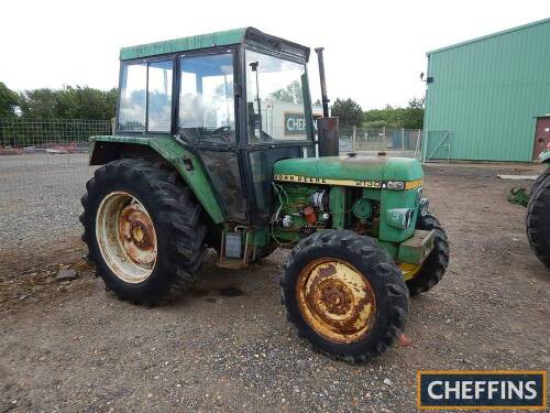 JOHN DEERE 2130 4cylinder diesel TRACTOR Serial No. 310423L Fitted with mechanical 4wd front axle, Sekura SEK293 cab, rear linkage and drawbar on 16.9/14-34 rear wheels and tyres