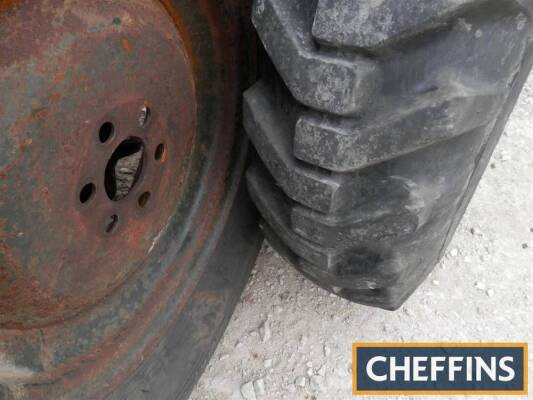 Pair of 15x24ins rear industrial tractor wheels and tyres with Fordson Major centres
