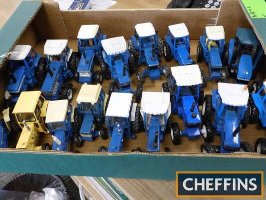 Ford model tractors, 17 larger scale unboxed, plastic and die-cast