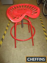 Red cast iron seat and a tubular swivel frame