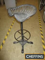 Cast iron seat and a 4 footed cast base, bar stool style