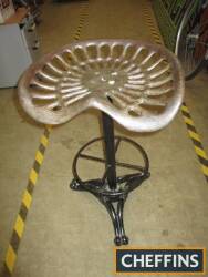 Cast iron seat and a 3 footed cast base, bar stool style