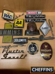 Collection of car badges and bonnet scripts