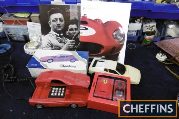 Ferrari merchandise, to include Eau de Toilette, telephone, radio together with Sotheby's catalogues