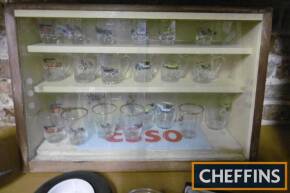 Glass cabinet of Veteran car themed drinking glasses