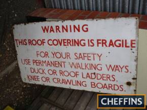 Warning This Roof Covering Is Fragile, an enamel sign