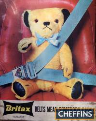 Britax seat belts, tin sign, 1960s, showing a teddy bear strapped into the seat, 38x47cm