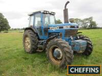 WITHDRAWN 1993 FORD 8630 Powershift 6cylinder diesel 4wd TRACTOR Reg. No. L499 PAH Serial No. A932367Fitted with Super Q cab, front weights and 40kph transmission. This tractor was originally supplied by Farm and County, Norfolk and is showing 7,711 hours