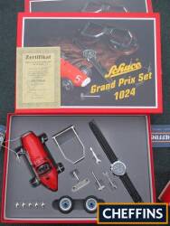 Shuco Grand Prix Set 1024, including a watch, Ferrari Grand Prix car in kit form, complete, unused and boxed with outer sleeve, 34.5cm x 24cm