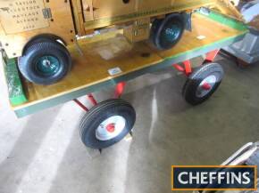 Varnished pine platform trailer approximately 4ft 6ins x 20ins x 20ins metal frame pneumatic tyres, made as a platform for previous lot (JUST THE TRAILER IN PHOTO)