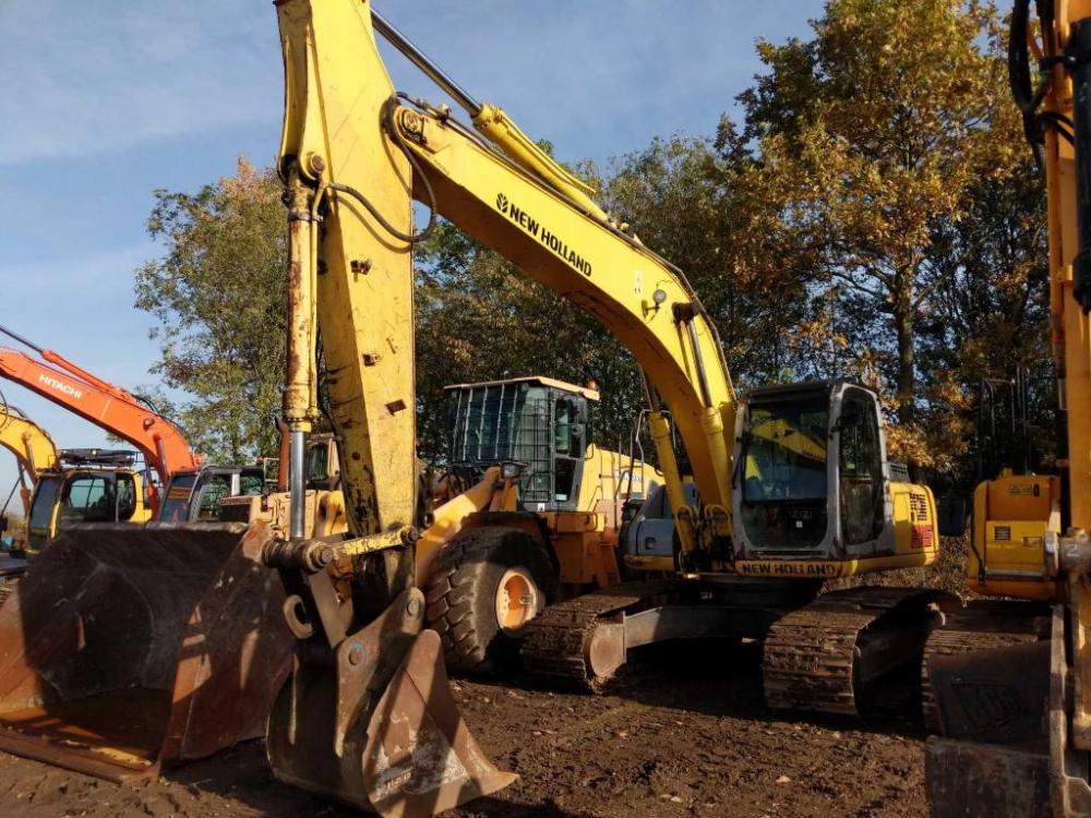 2007 New Holland 215 Excavator c/w bucket, hammer lines Ser. No